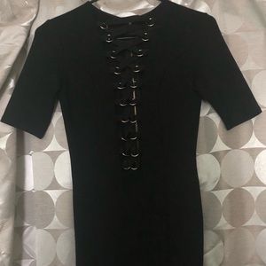 Chic black dress with lace up front